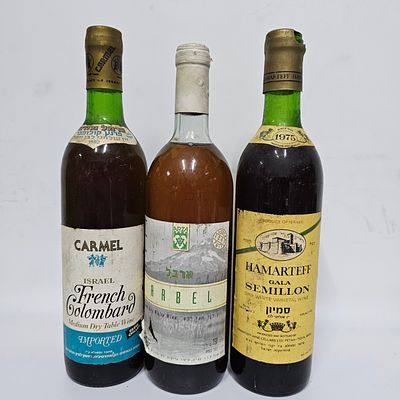 לוט שלושה בקבוקי אלכוהול. 
1. יין פרנץ קולומבר - יקבי כרמל מזרחי. 
יין שולחני לבן מעולה - 750 