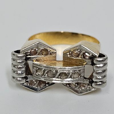 טבעת מזהב 18 קראט משובצת 12 יהלומים בליטוש ישן משקל הטבעת 7.47 גרם מידת הטבעת 7