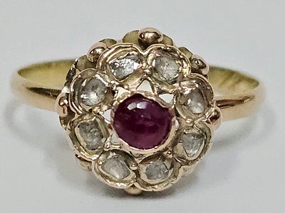 טבעת מזהב 14 קראט משובצת יהלומים בליטוש ישן ורובי מצורף תעודות גמולוגיות חברת E.G משקל הטבעת 