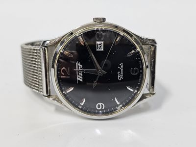 שעון לגברים קוורץ תוצרת TISSOT קוטר השעון 37 מ"מ , השעון עובד , 
. בית המכירות לא בודק דיוק שויצרי ,