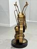 ** Arman - ** Arman 
1928-2005 (French, American) 
Bronze Violin and instruments sculpture 
160 cm תמונה - 1