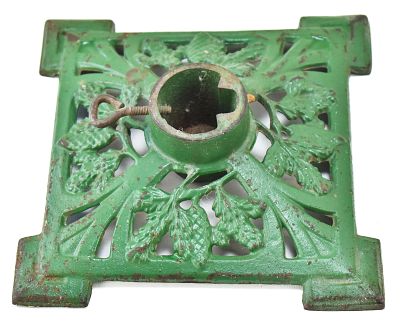 GERMAN CAST IRON CHRISTMAS TREE STAND FEATURING FOLIAGE; EARLY 1900s. A German cast iron 