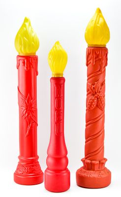 THREE CHRISTMAS BLOW MOLD CANDLES. Three Christmas blow mold candles. One is marked Empire and 