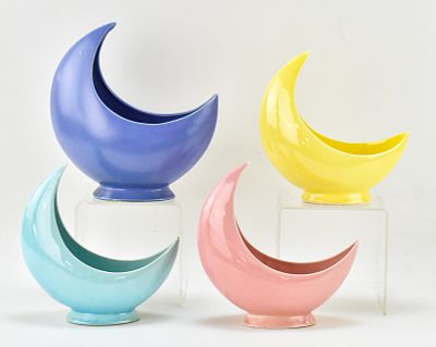 ASSORTED CRESCENT MOON POTTERY VASES. An assortment of crescent moon pottery vases in the style 