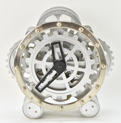 KIKKERLAND GEAR CLOCK. A contemporary Kikkerland gear wall clock measuring 11" H x 10.5" W x 4" D.