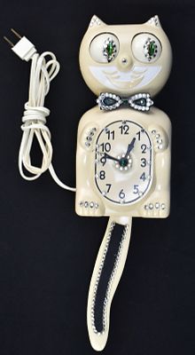 1960s KIT KAT CLOCK. A 1960s Kit Cat Klock made by California Clock Company, ivory with green 