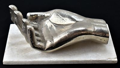 CAST ALUMINUM HAND SCULPTURE ON MARBLE BASE. A cast aluminum hand sculpture with open palm on a 