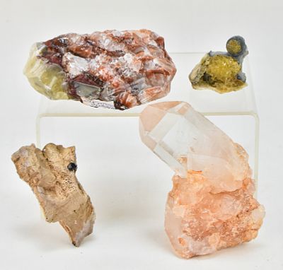 COLLECTION OF CRYSTALS. A collection of crystals, including: one green and red rhombohedral 