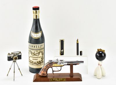 MIDCENTURY LIGHTER COLLECTION: HENNESSEY COGNAC, LUMIX CAMERA, & MORE. A collection of six 
