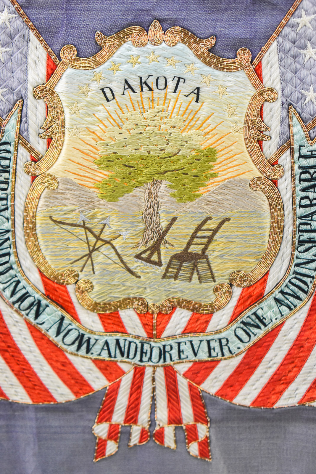 H. IMAMURA FRAMED DAKOTA TERRITORY COAT OF ARMS EMBROIDERY