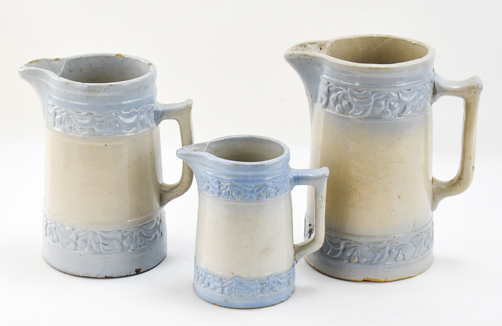 THREE RED WING STONEWARE COMPANY (ATTR.) "CHERRY BAND" SALT-GLAZED PITCHERS