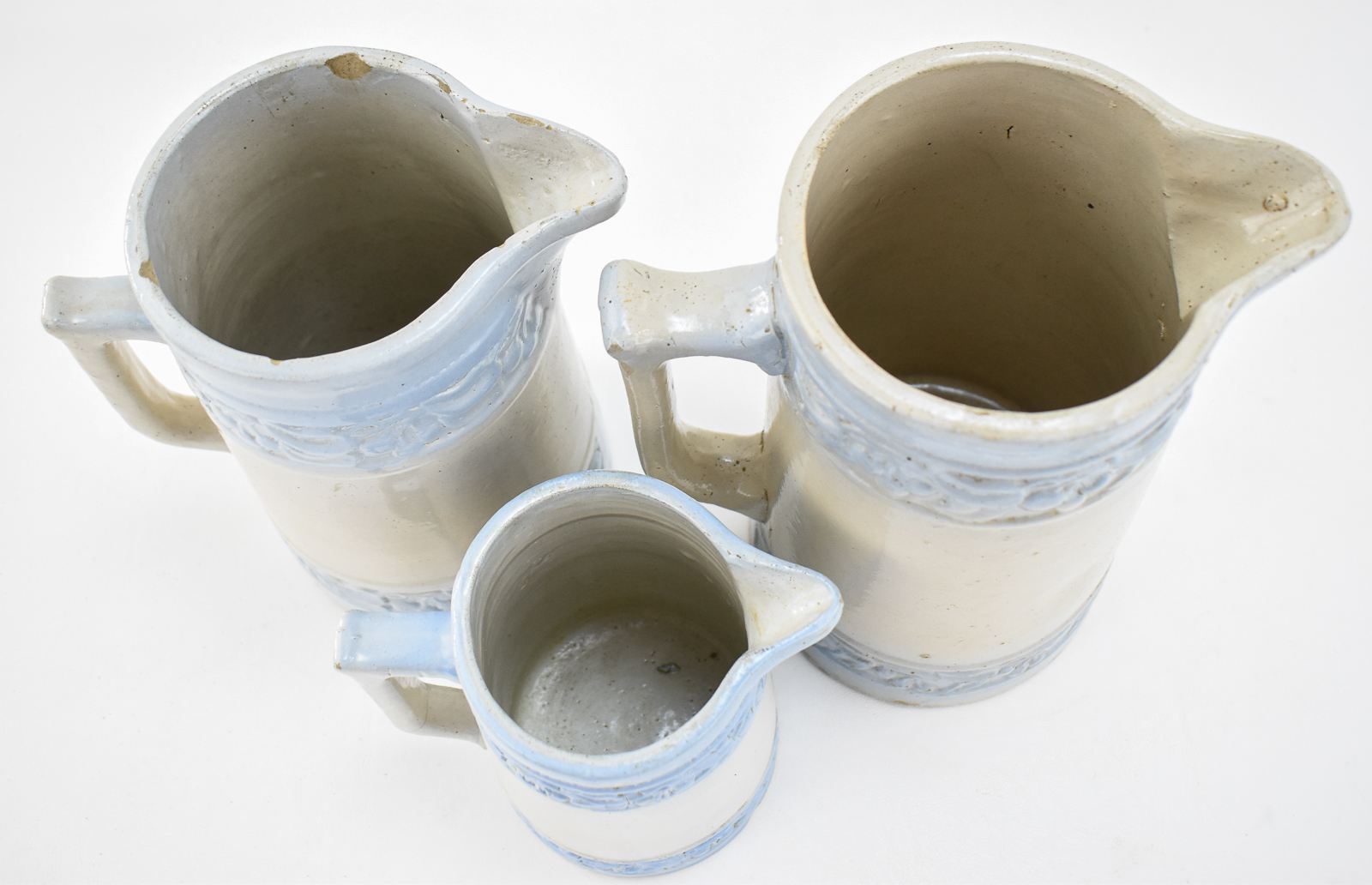 THREE RED WING STONEWARE COMPANY (ATTR.) "CHERRY BAND" SALT-GLAZED PITCHERS