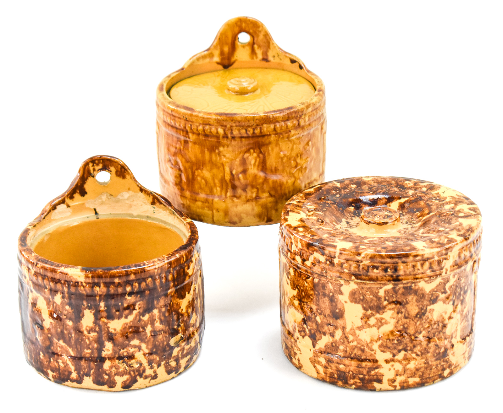 ROCKINGHAM-GLAZED SPONGE WARE SALT CELLARS AND COVERED JAR