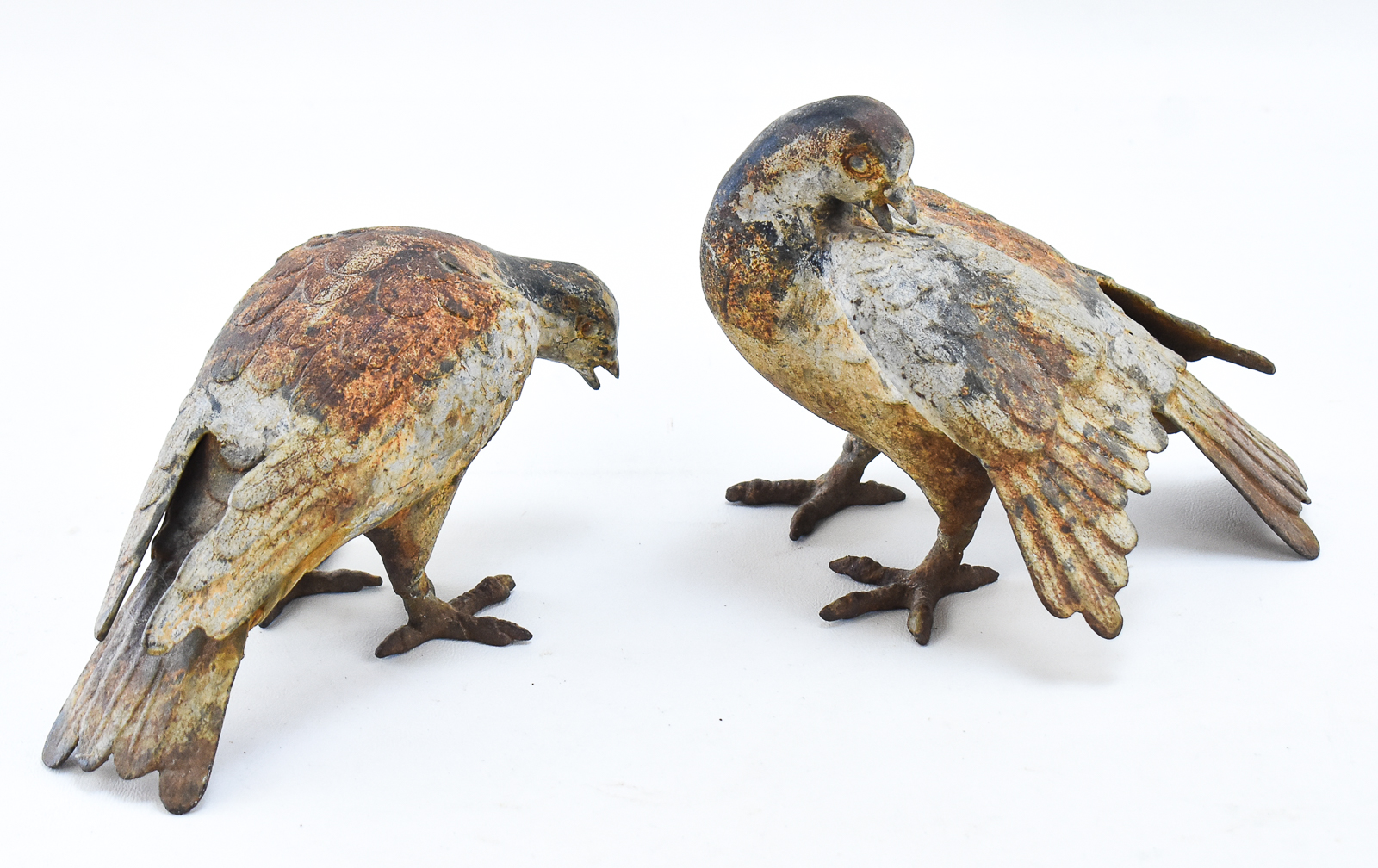 PAIR OF JAPANESE STYLE CAST IRON CARRIER PIGEON GARDEN ORNAMENTATIONS
