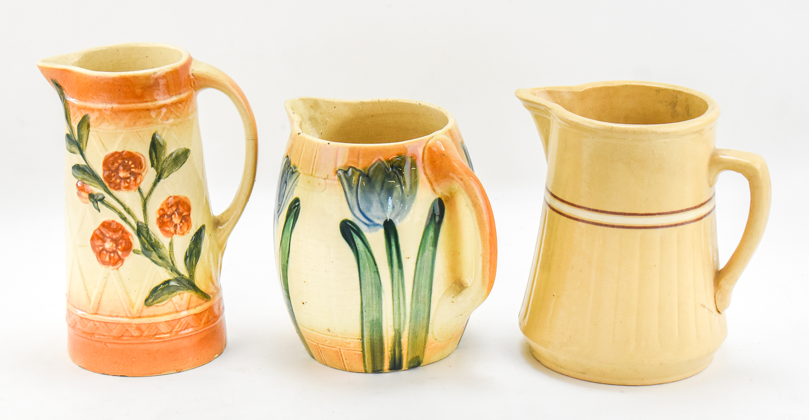 MID CENTURY PITCHERS: ROSEVILLE "TULIPS", "WILD ROSES", AND RED WING SAFFRON WARE
