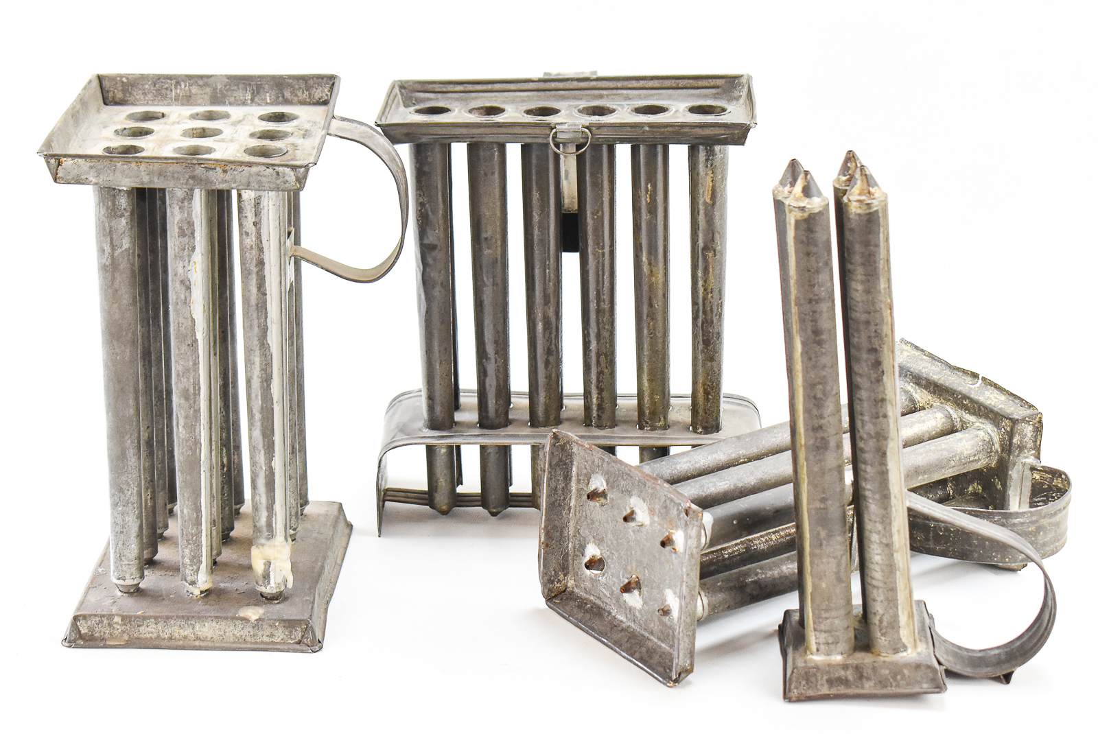 COLLECTION OF FOUR AMERICAN TAPER CANDLE MOLDS