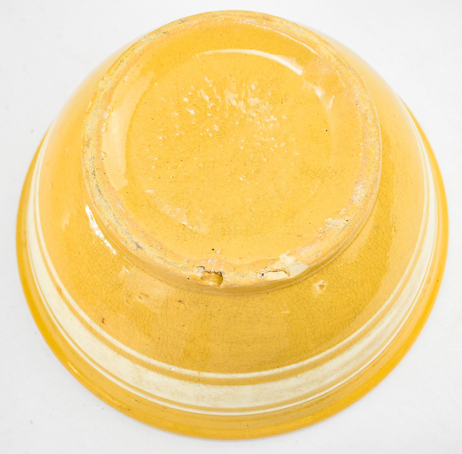 FIVE 'DANDY LINE' YELLOW WARE BOWLS