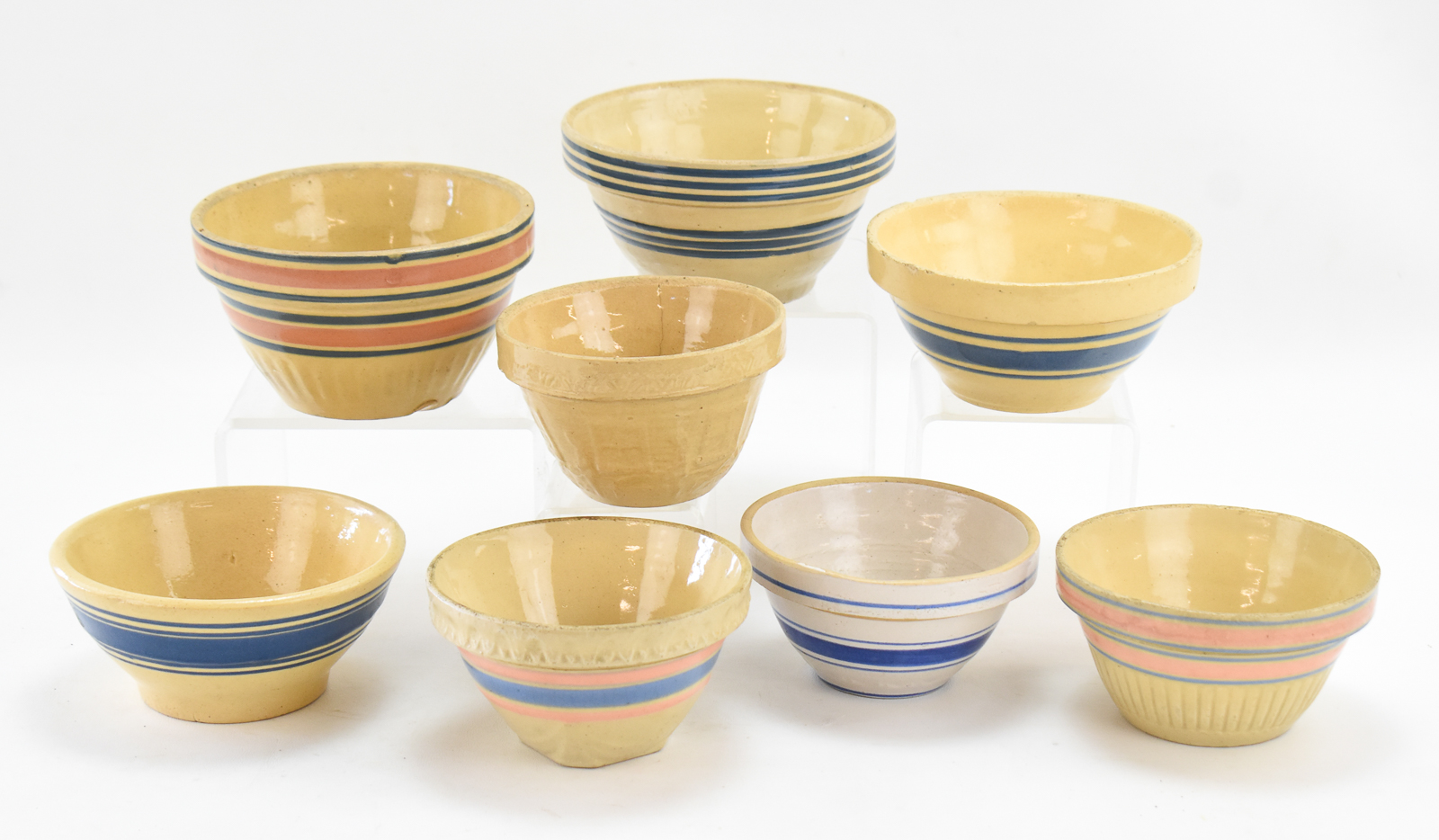 ASSORTMENT OF EIGHT YELLOW WARE MIXING BOWLS: MCCOY AND HULL POTTERY