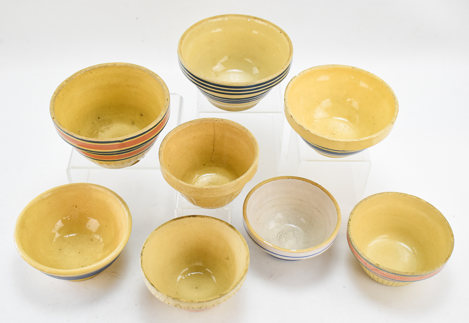 ASSORTMENT OF EIGHT YELLOW WARE MIXING BOWLS: MCCOY AND HULL POTTERY