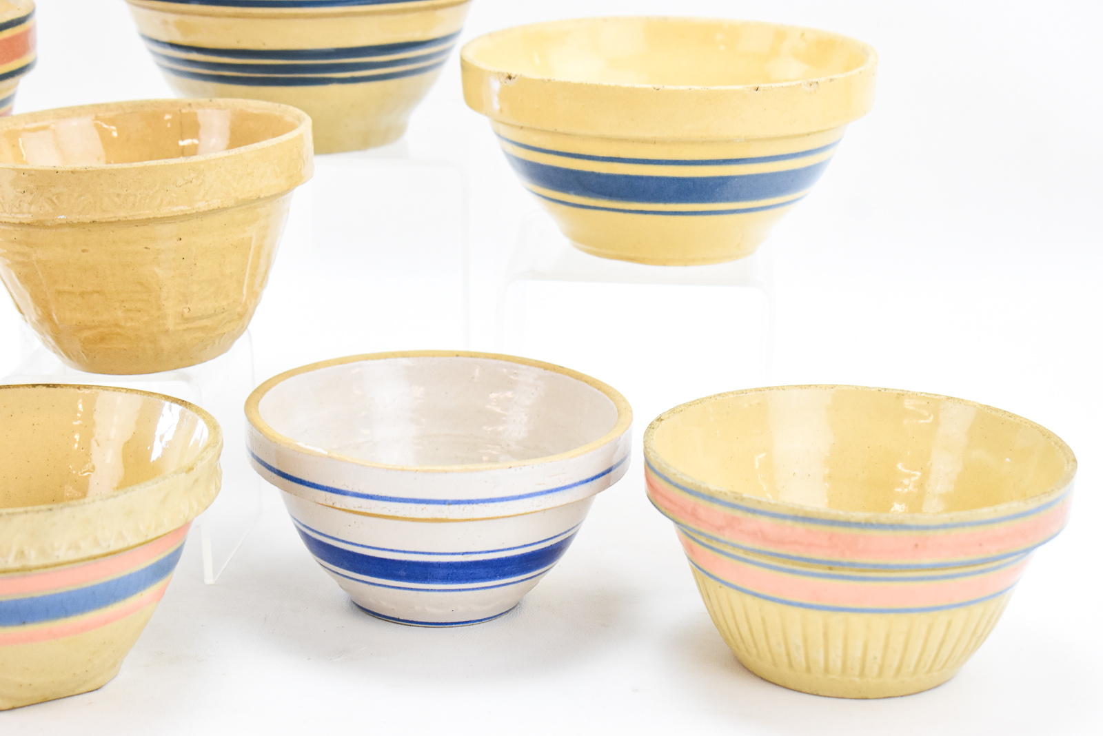 ASSORTMENT OF EIGHT YELLOW WARE MIXING BOWLS: MCCOY AND HULL POTTERY