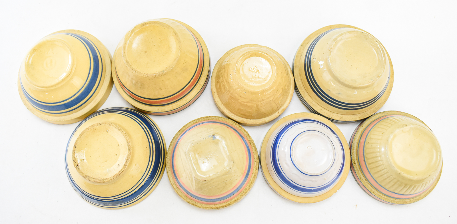 ASSORTMENT OF EIGHT YELLOW WARE MIXING BOWLS: MCCOY AND HULL POTTERY