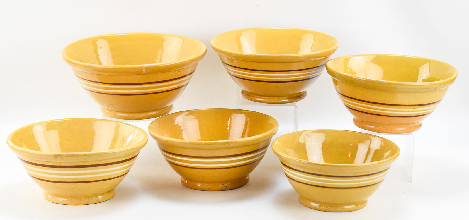 ASSORTMENT OF SIX LARGE BANDED YELLOW WARE BOWLS