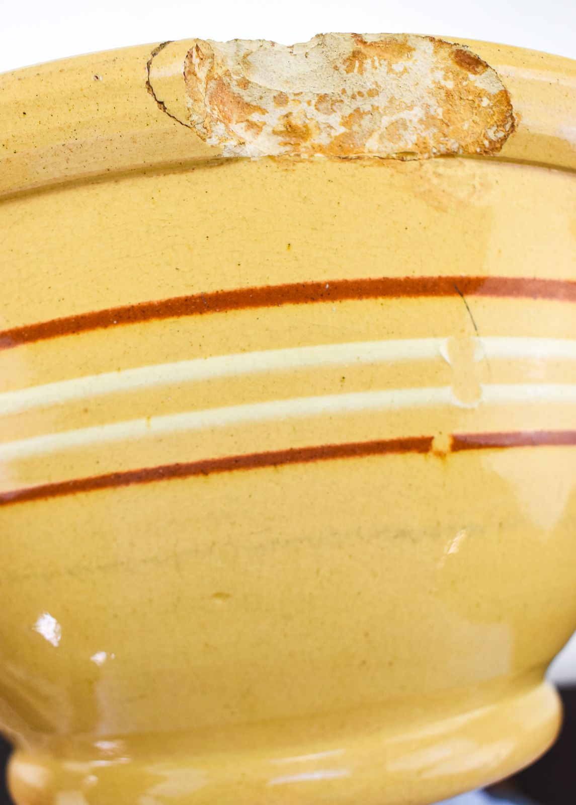 ASSORTMENT OF FIVE BANDED YELLOW WARE BOWLS