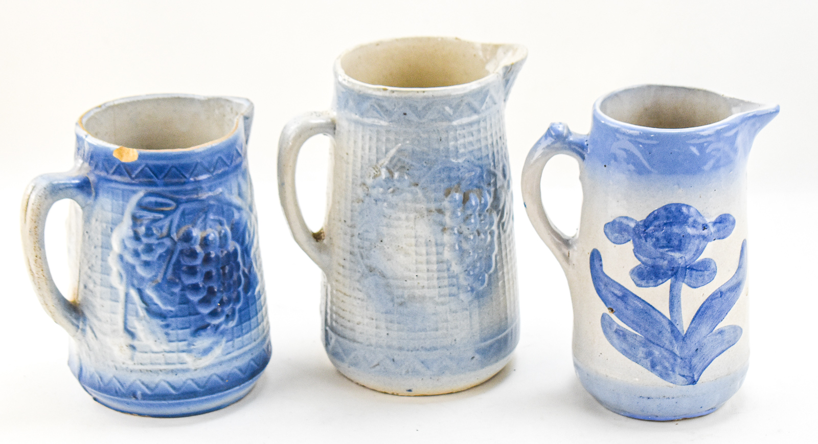TRIO OF AMERICAN BLUE-AND-WHITE STONEWARE PITCHERS