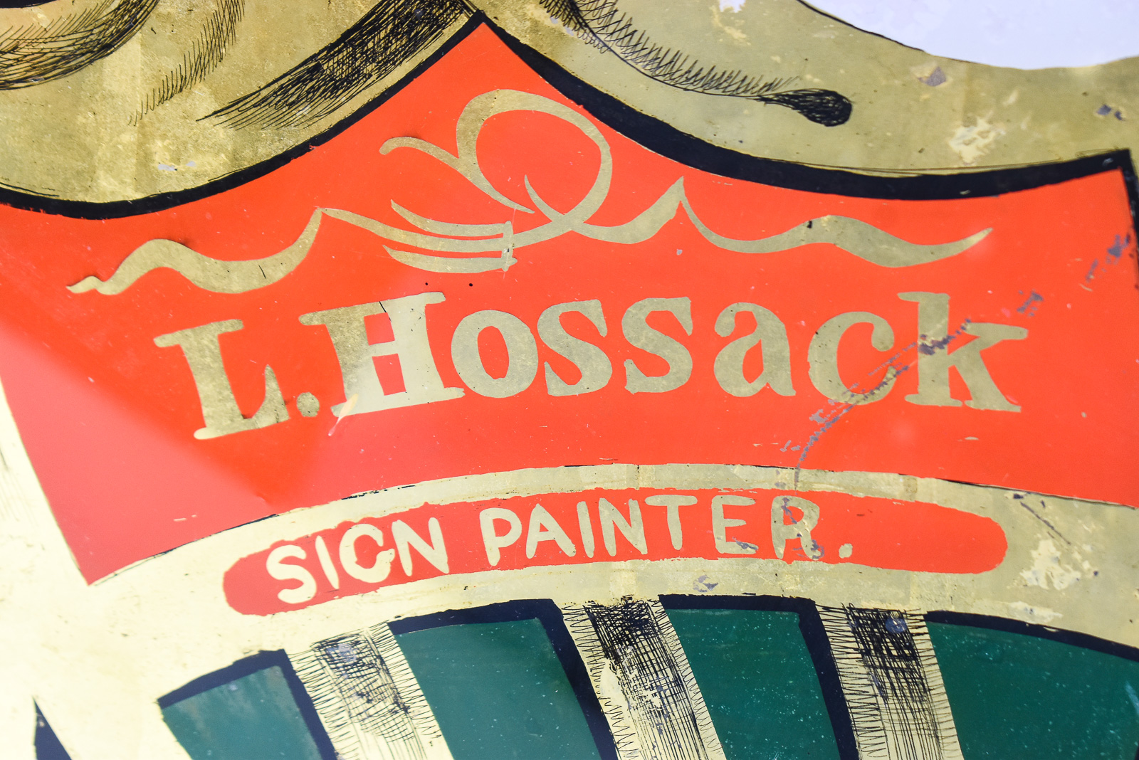 L. HOSSACK REVERSE-PAINTED GLASS BUSINESS TRADE SIGN
