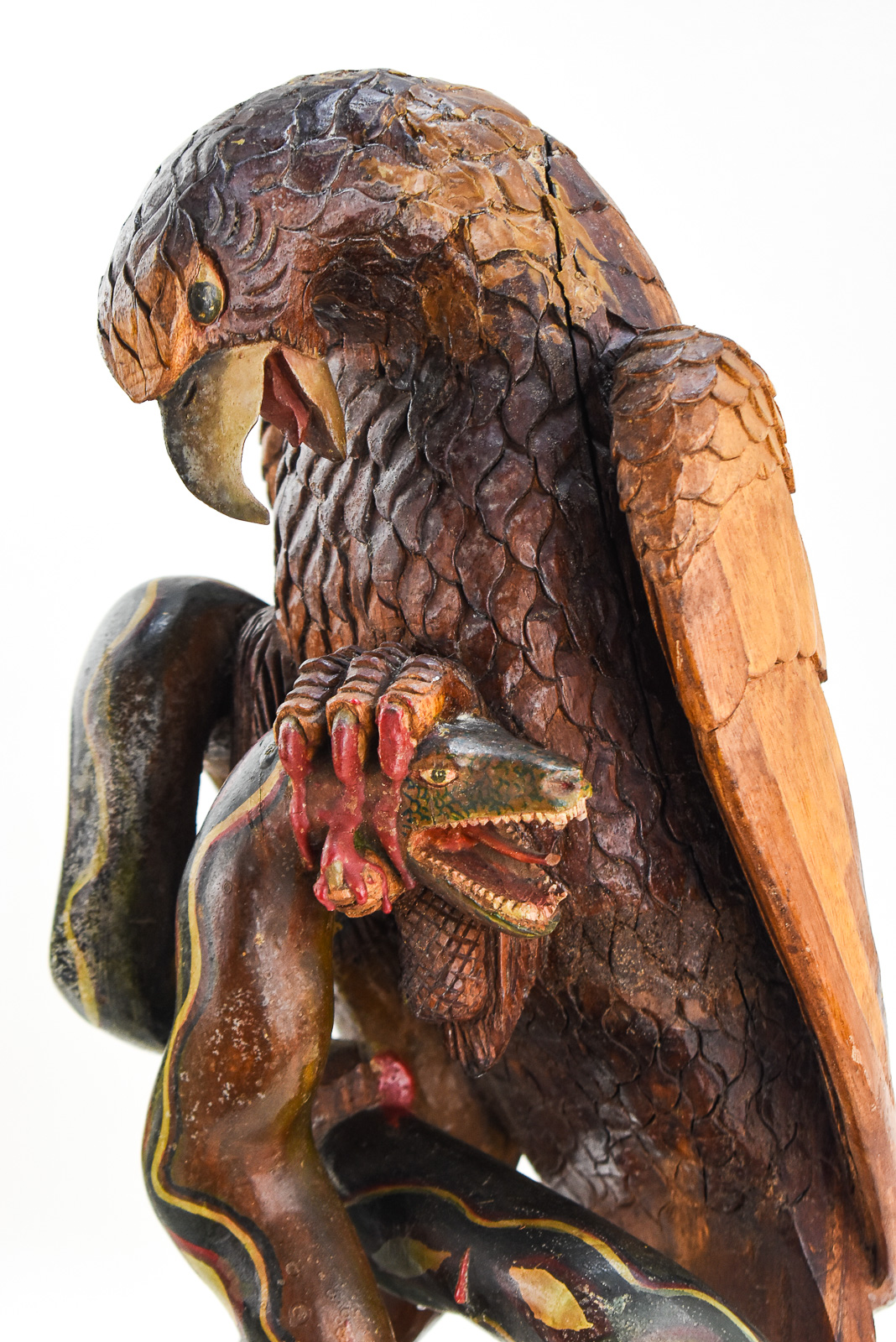 FOLK ART HAND-CARVED COPAL POLYCHROME EAGLE AND SERPENT SCULPTURE