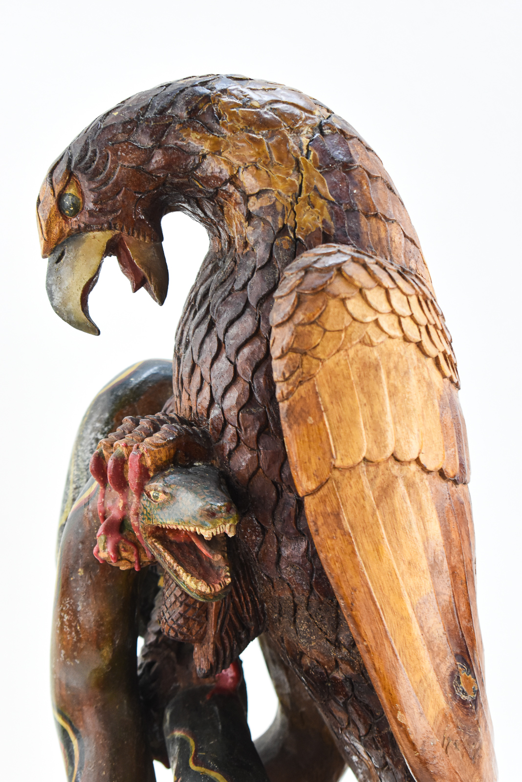 FOLK ART HAND-CARVED COPAL POLYCHROME EAGLE AND SERPENT SCULPTURE