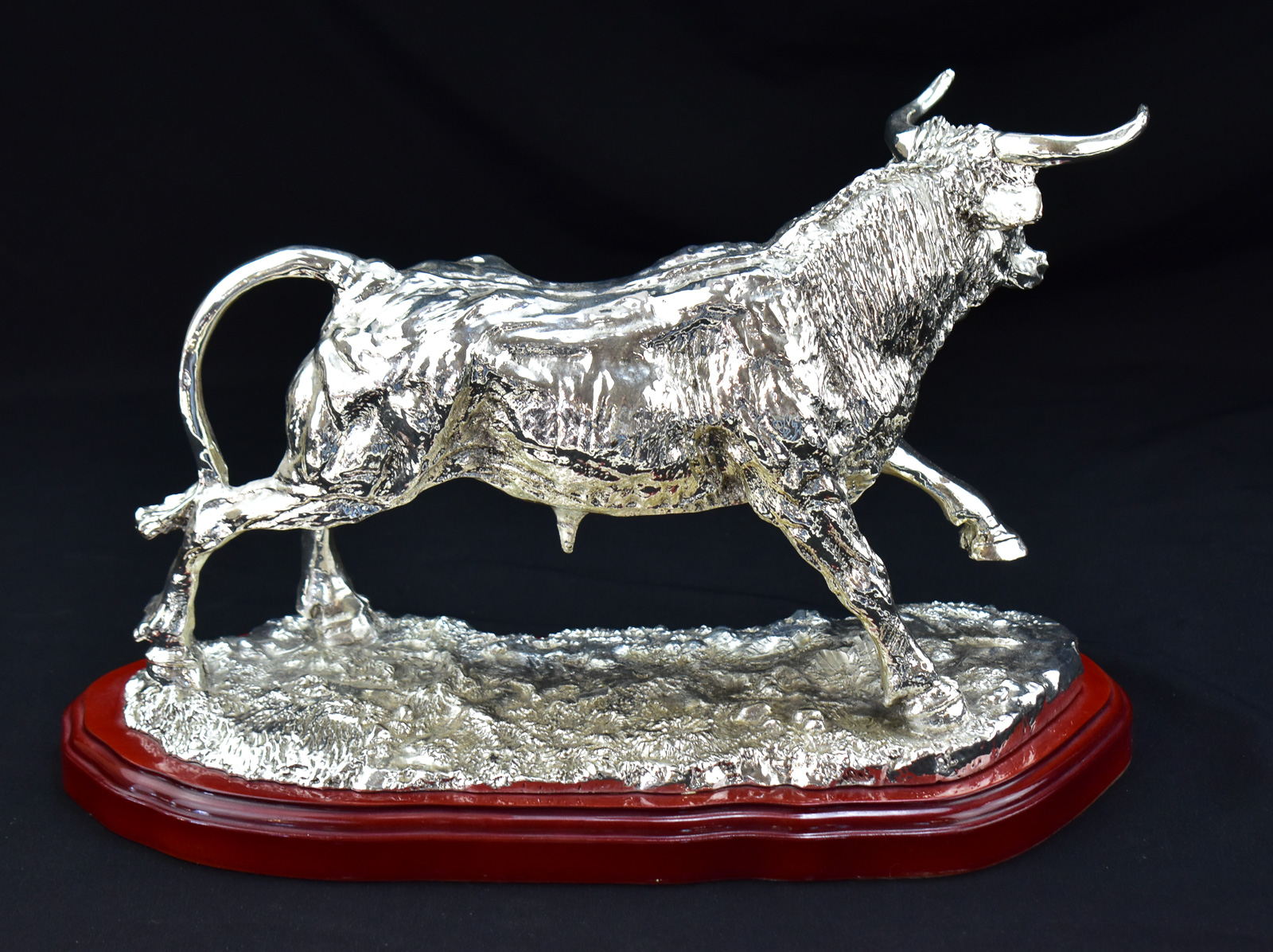 JOYA SUR SILVER-PLATED CHARGING BULL STATUE
