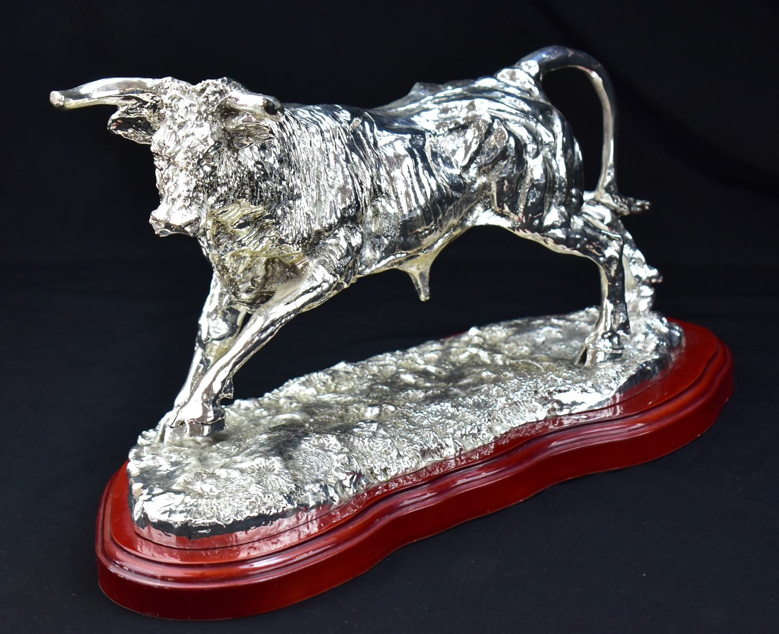 JOYA SUR SILVER-PLATED CHARGING BULL STATUE