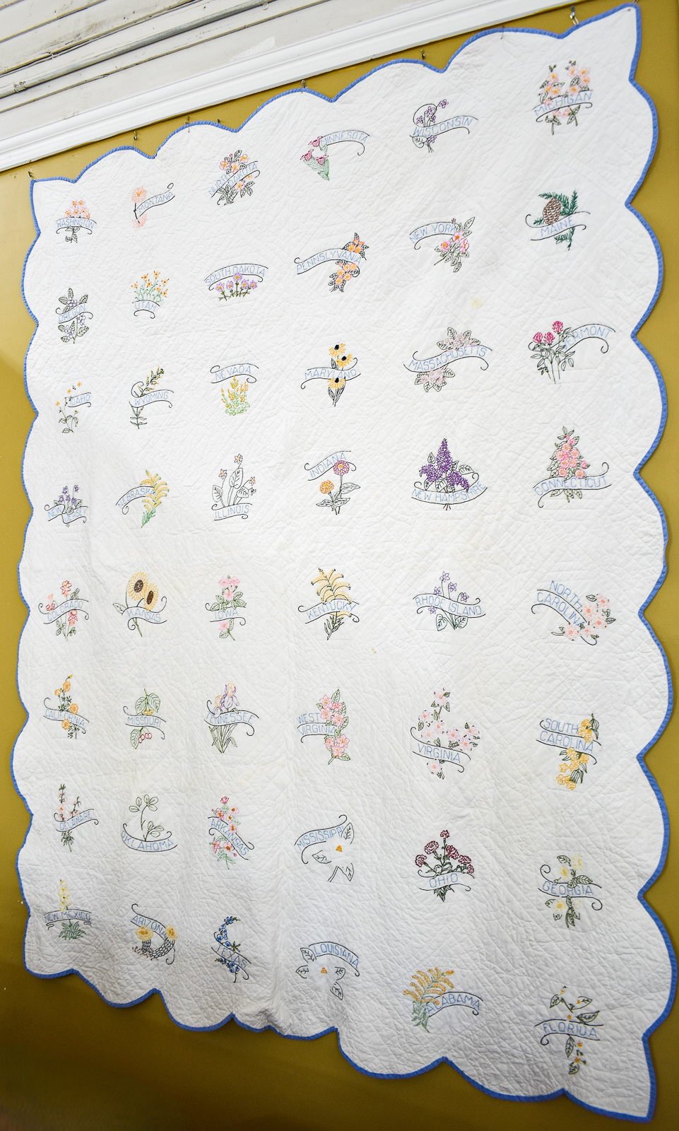 HAND EMBROIDERED STATE FLOWER QUILT
