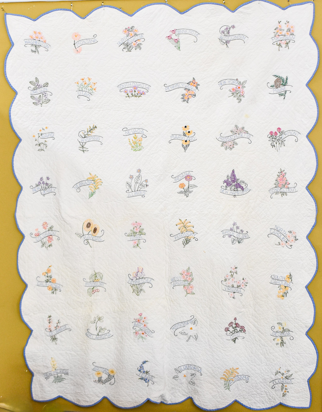 HAND EMBROIDERED STATE FLOWER QUILT