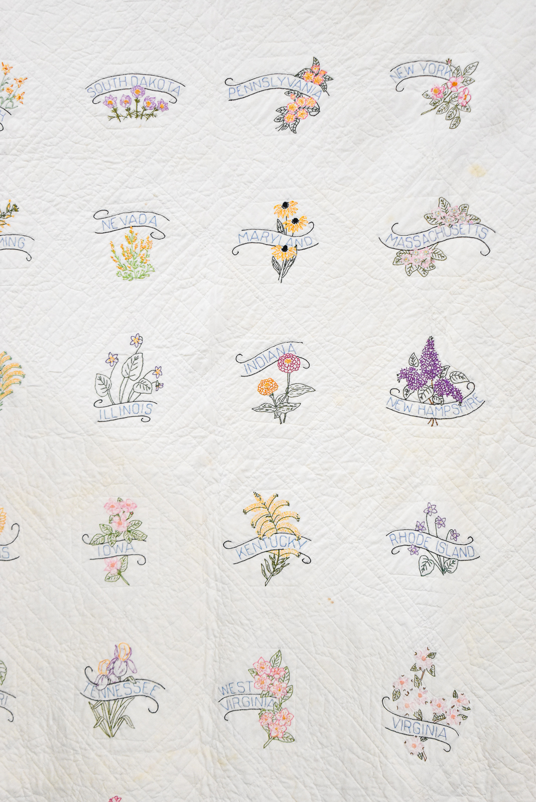 HAND EMBROIDERED STATE FLOWER QUILT