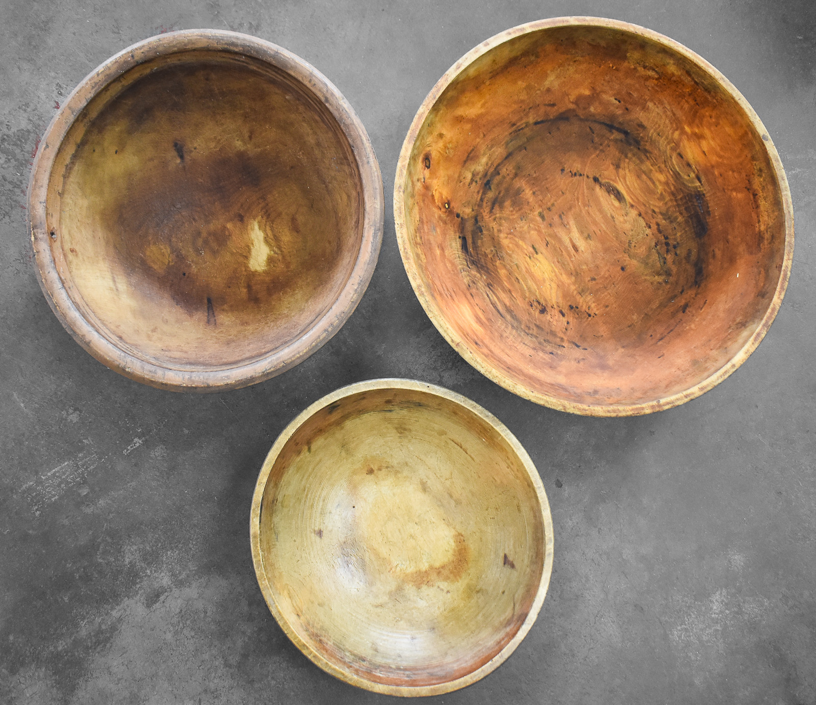 THREE PRIMITIVE-STYLE HAND-TURNED WOOD BOWLS