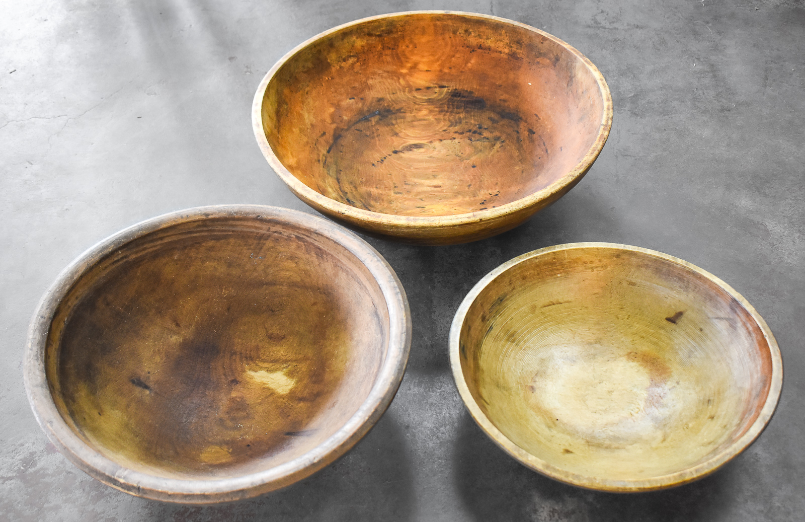 THREE PRIMITIVE-STYLE HAND-TURNED WOOD BOWLS