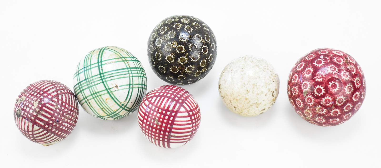 SIX VICTORIAN CARPET BALLS: 'CROSS-HATCH' AND 'SUN BURST' PATTERN