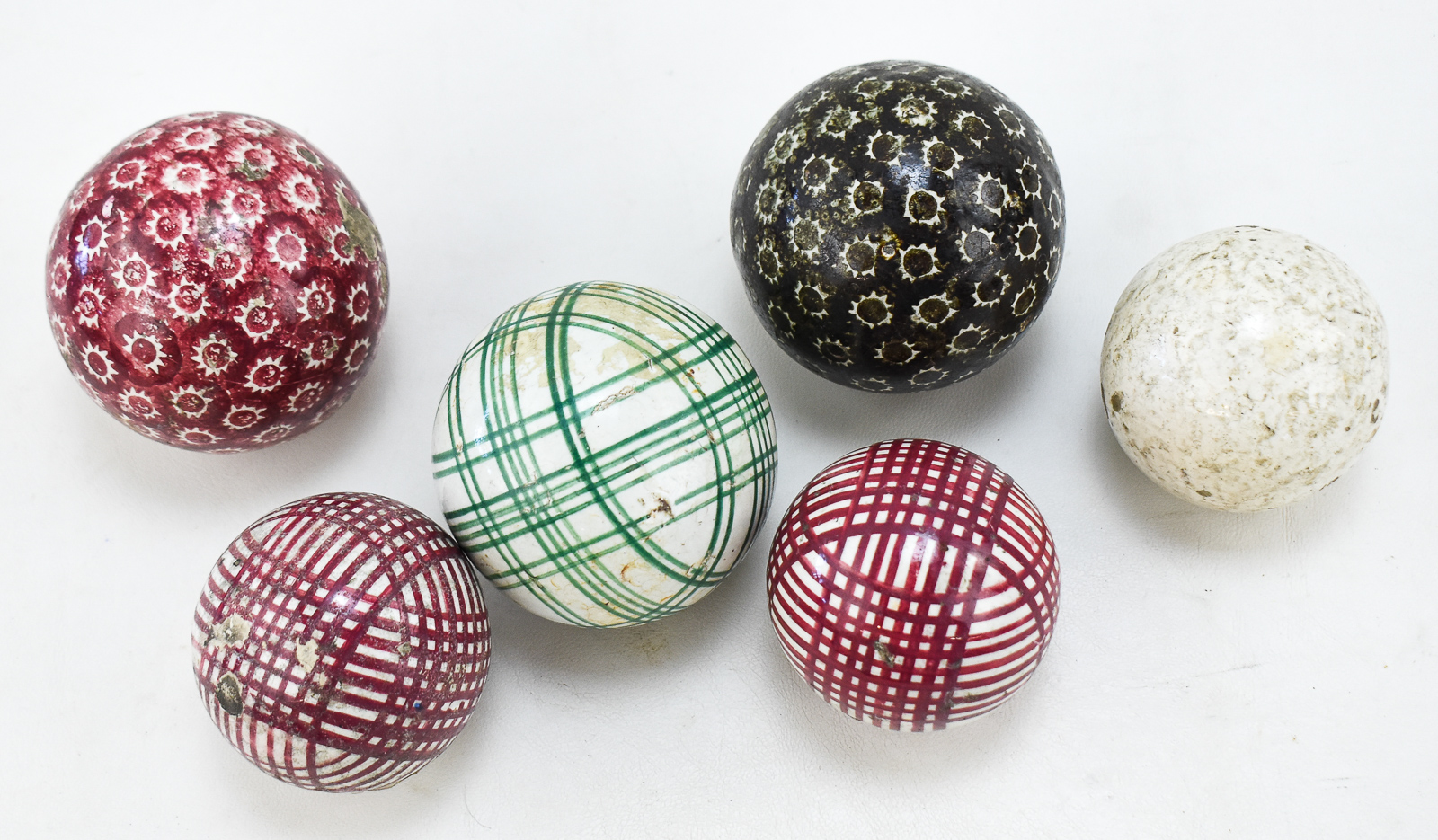 SIX VICTORIAN CARPET BALLS: 'CROSS-HATCH' AND 'SUN BURST' PATTERN