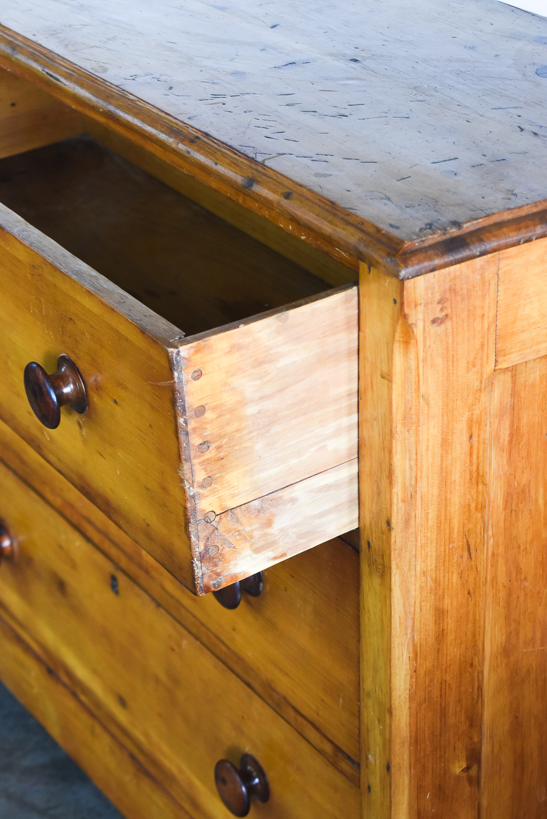 KNOTTY PINE THREE-DRAWER CHEST OF DRAWERS