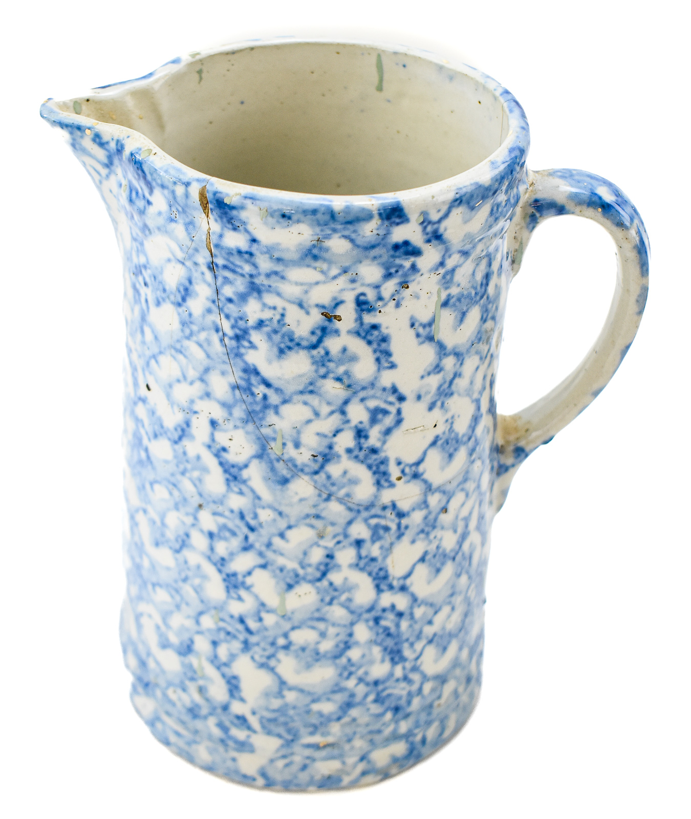 FOUR BLUE-AND-WHITE SPONGEWARE PITCHERS
