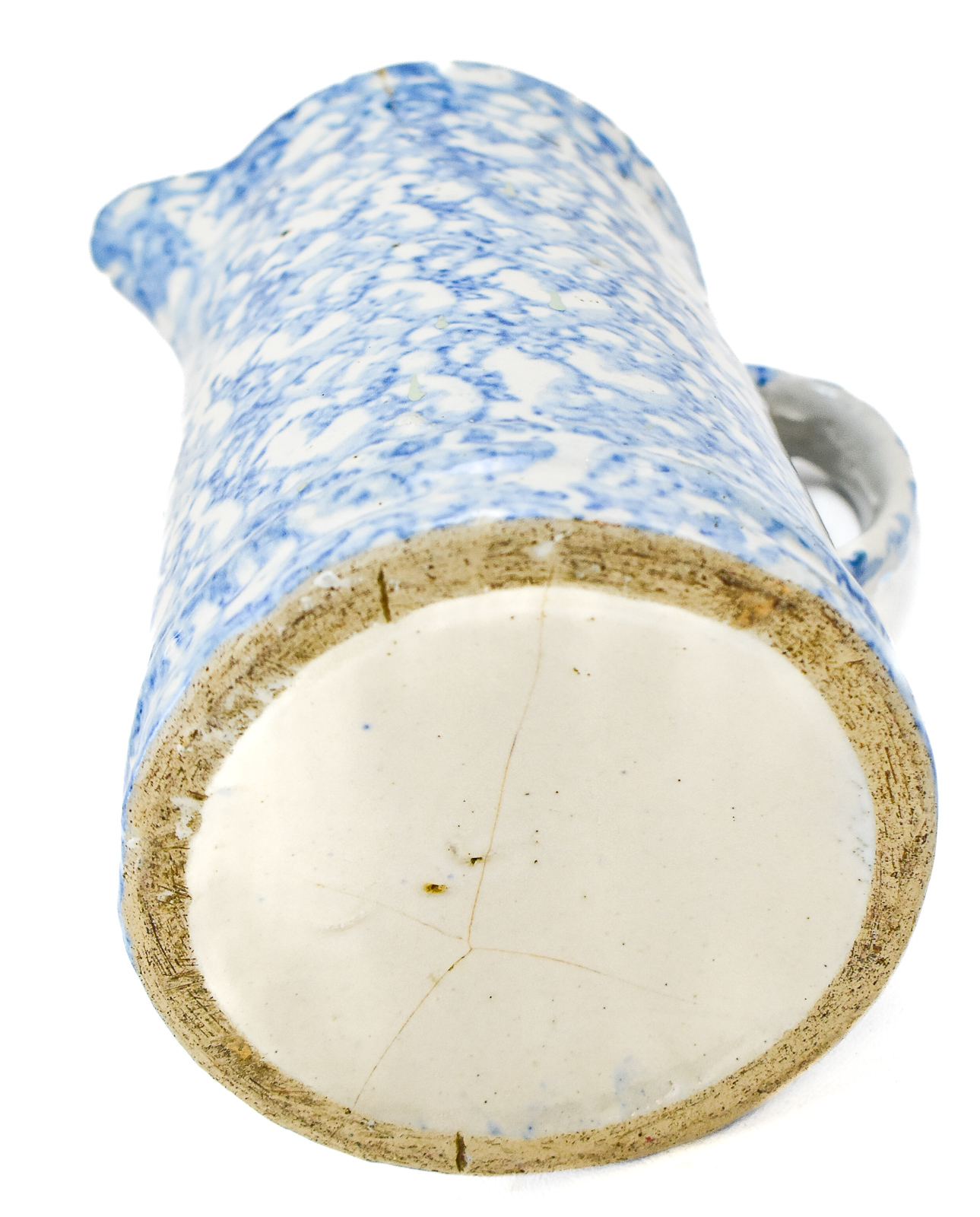 FOUR BLUE-AND-WHITE SPONGEWARE PITCHERS