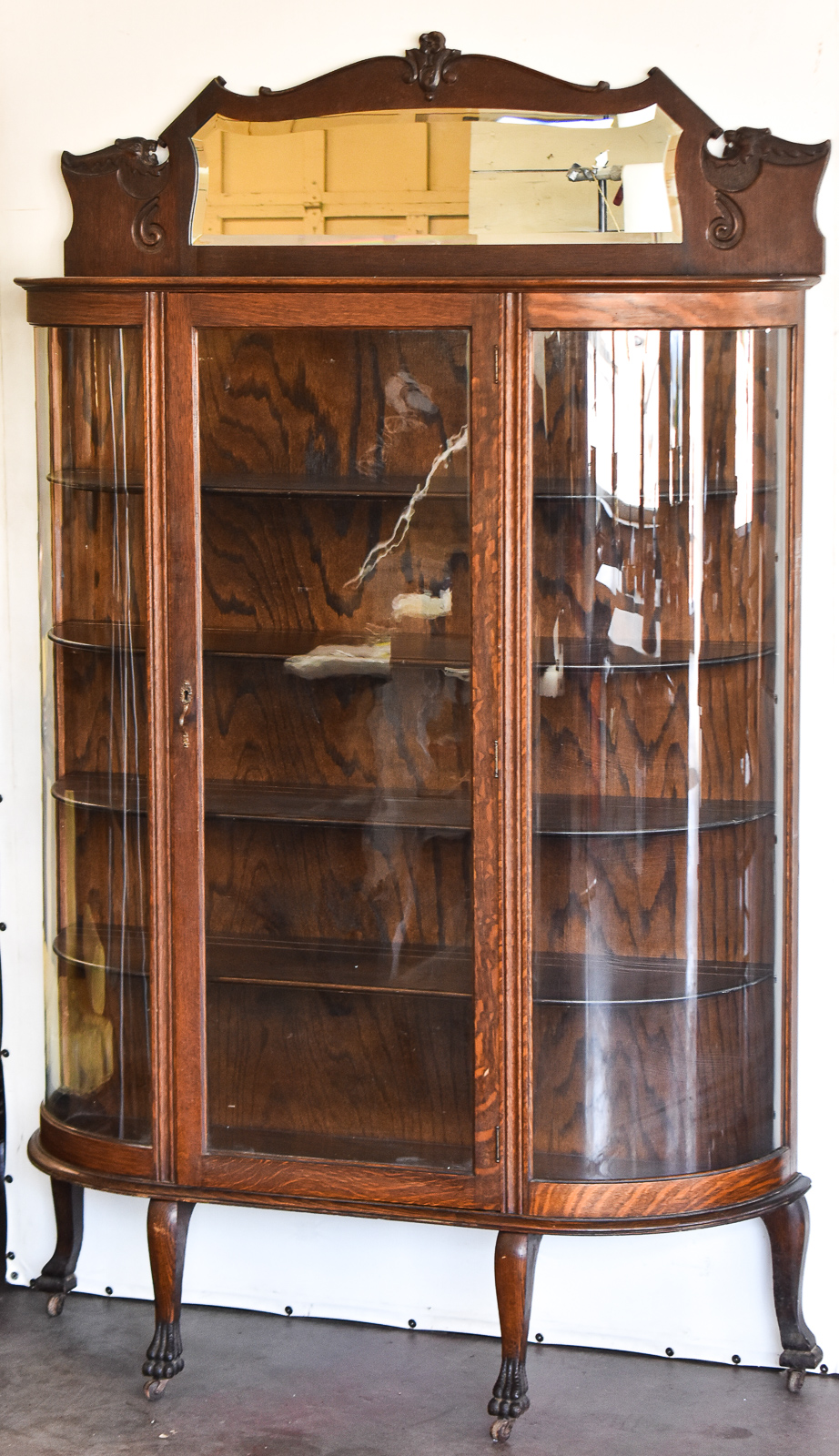 AMERICAN EMPIRE BOW FRONT CURIO CABINET