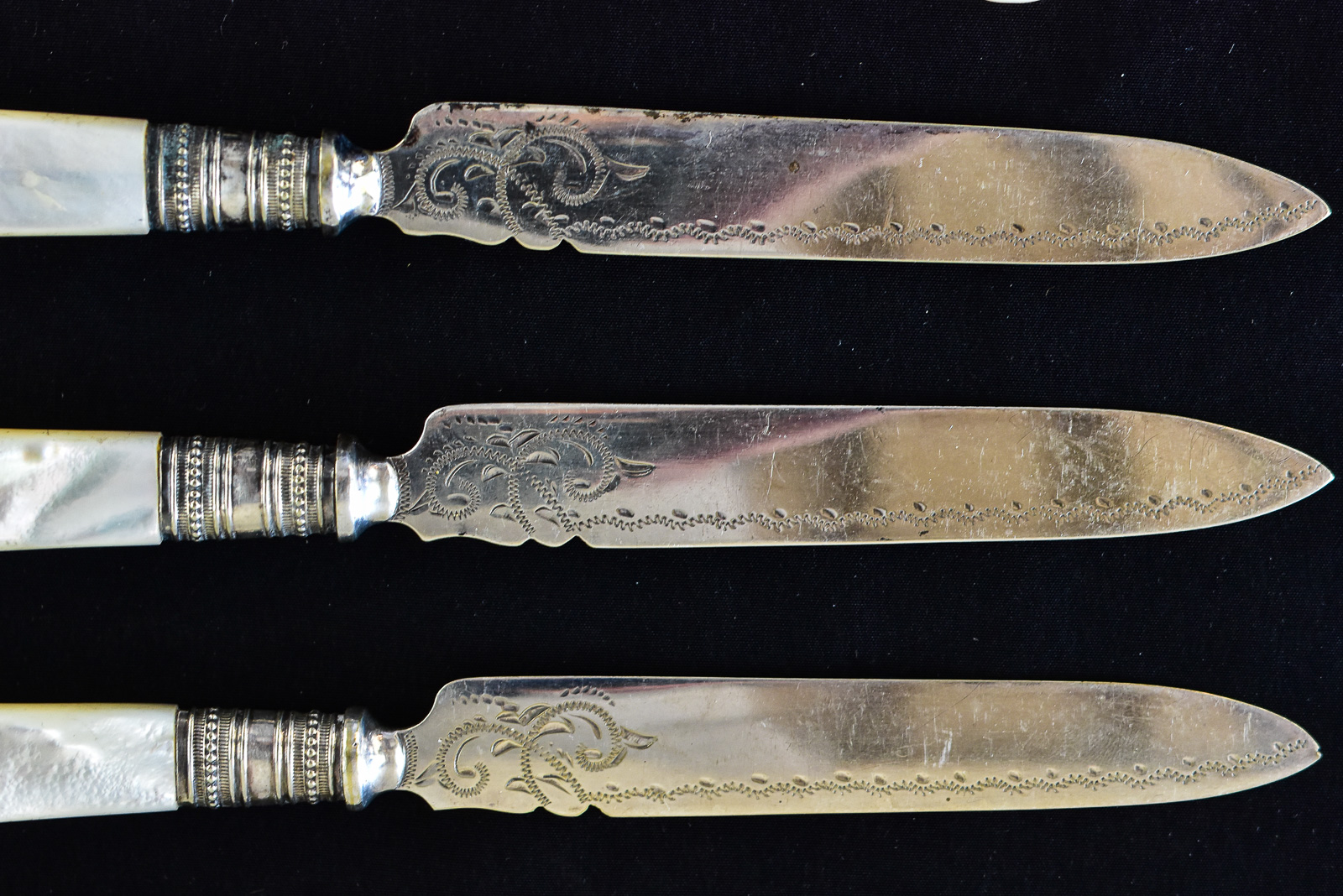 ASSORTED SILVER-PLATED FLATWARE W/ MOTHER OF PEARL HANDLES