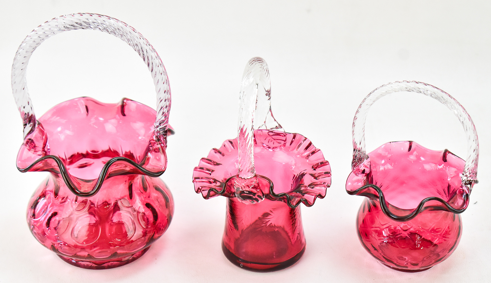 TRIO OF FENTON CRANBERRY GLASS BASKETS