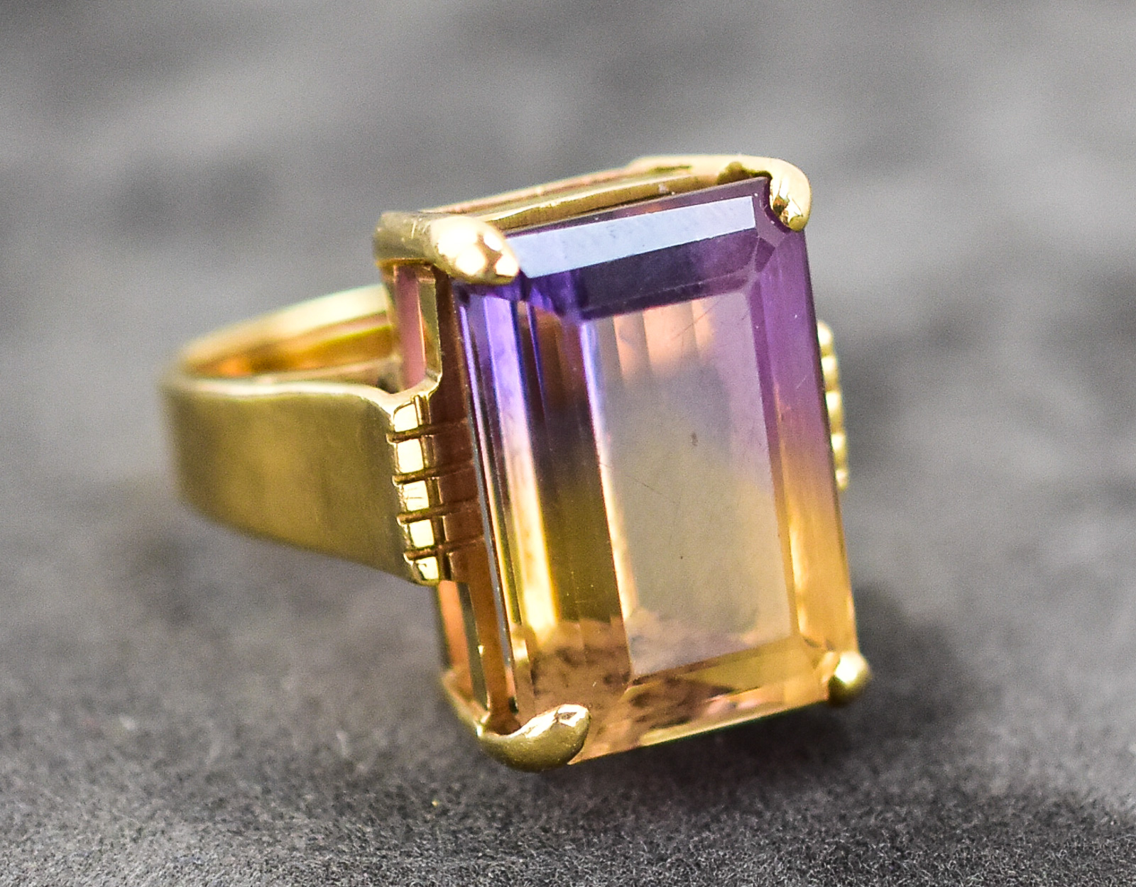 14KT GOLD & EMERALD CUT TOPAZ SOLITAIRE RING