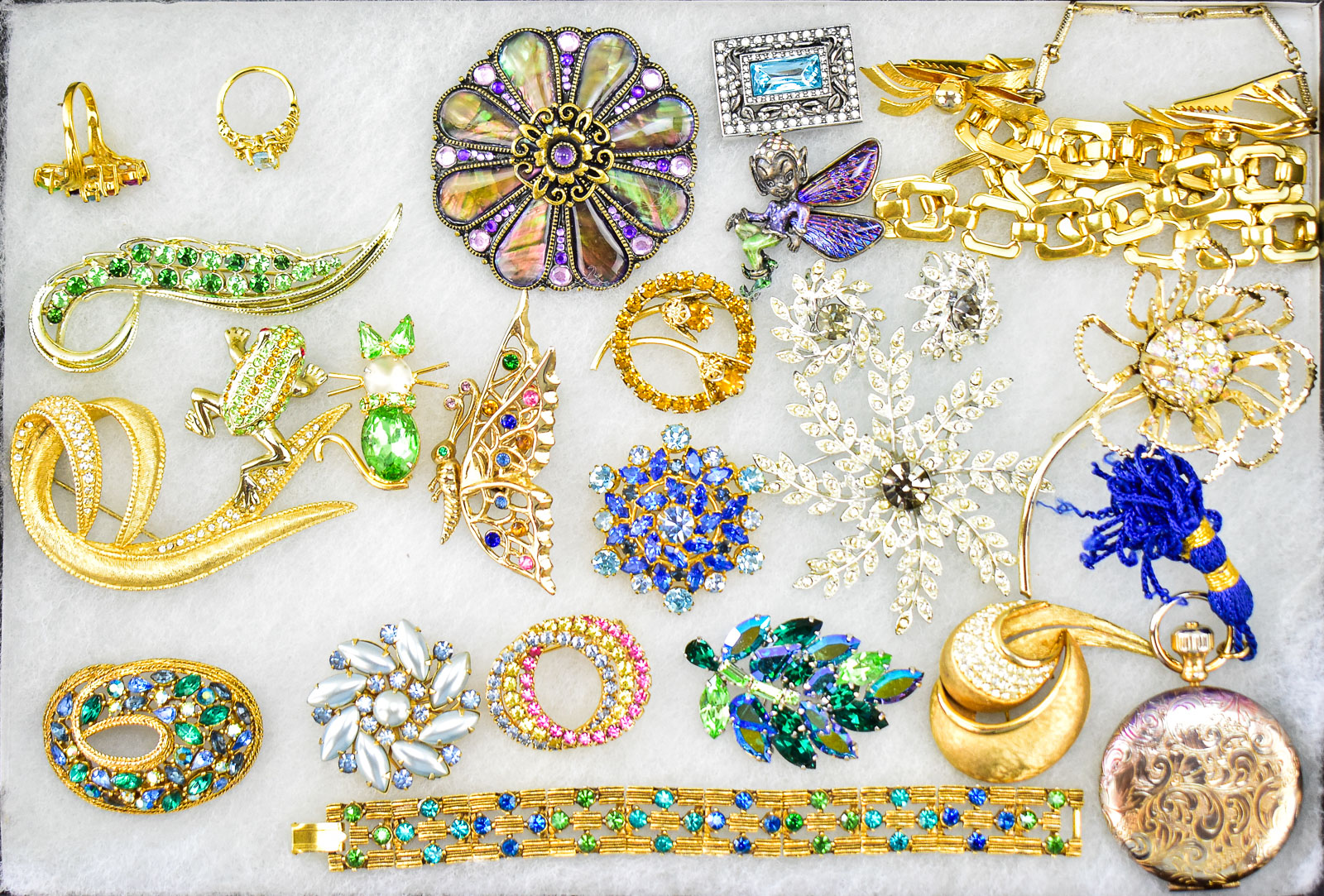 RHINESTONE COSTUME JEWLERY ASSORTMENT; ESTEE LAUDER, FLORENZA, JOAN RIVERS, ETC.