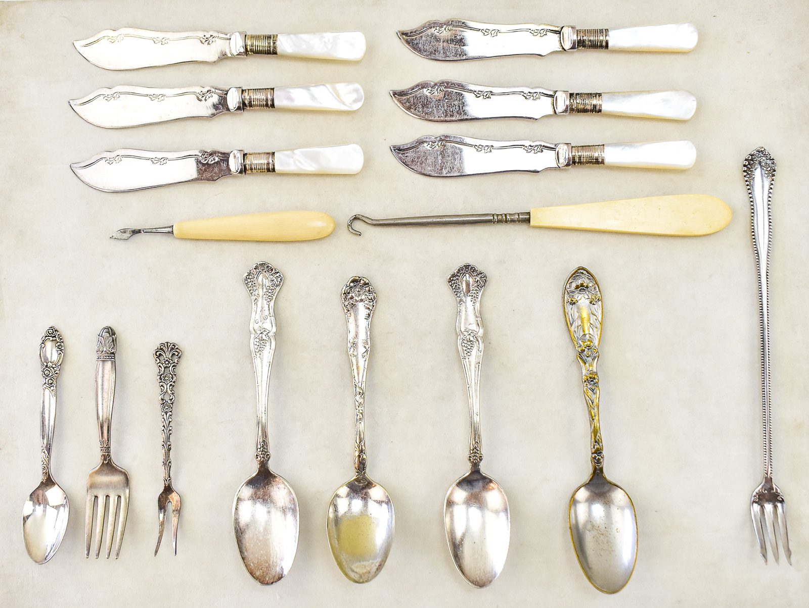 ASSORTMENT OF SILVER-PLATE FLATWARE