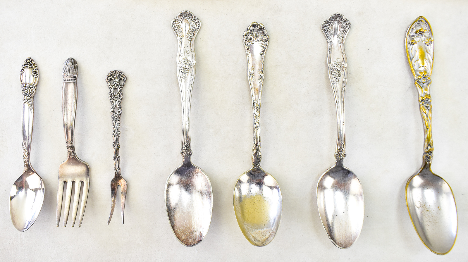 ASSORTMENT OF SILVER-PLATE FLATWARE
